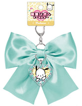 Elevate your everyday style with our Glam  Pochacco Satin Bow Keychain in soft aqua! This elegant accessory perfectly combines Sanrio's iconic charm with glam design elements. The stunning soft aqua satin bow is complemented by a special centerpiece; a sparkling  Pochacco acrylic charm that adds an extra touch of kawaii flair. Built with quality in mind, this keychain features a durable metal attachment that makes it perfect for your keys, bags, or starting your Sanrio collection.